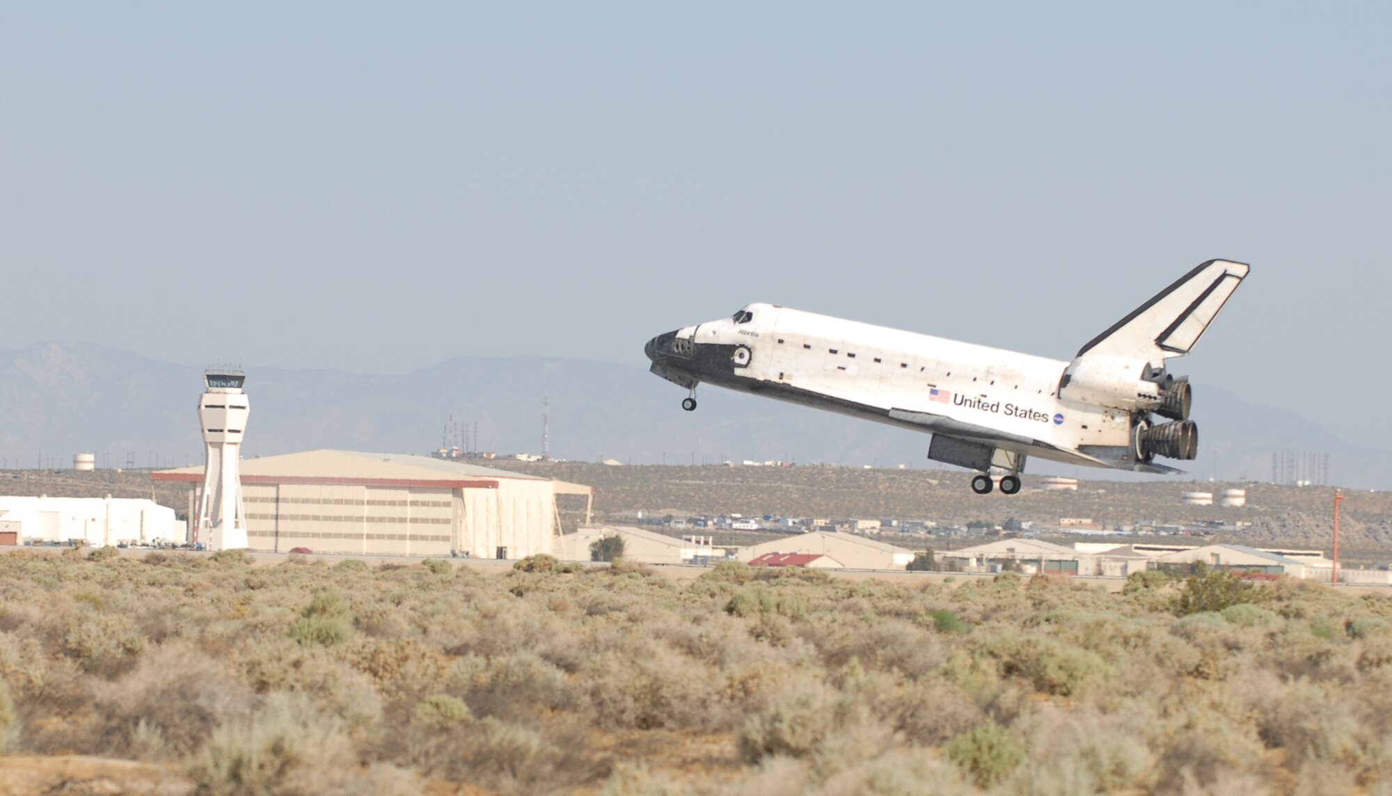 Space shuttle STS-125 Atlantis lands at Edwards May 24 after completing a 13-day journey of approximately 5.3 million miles in space. The Atlantis crew performed five spacewalks on five consecutive days to repair and upgrade the Hubble Space Telescope. In preperation for this, Edwards is required to undergo two exercises a year by Human Space Flight to ensure the base's capabilities to support a shuttle landing meets NASA's standards. (U.S. Air Force photo/Senior Airman Julius Delos Reyes)