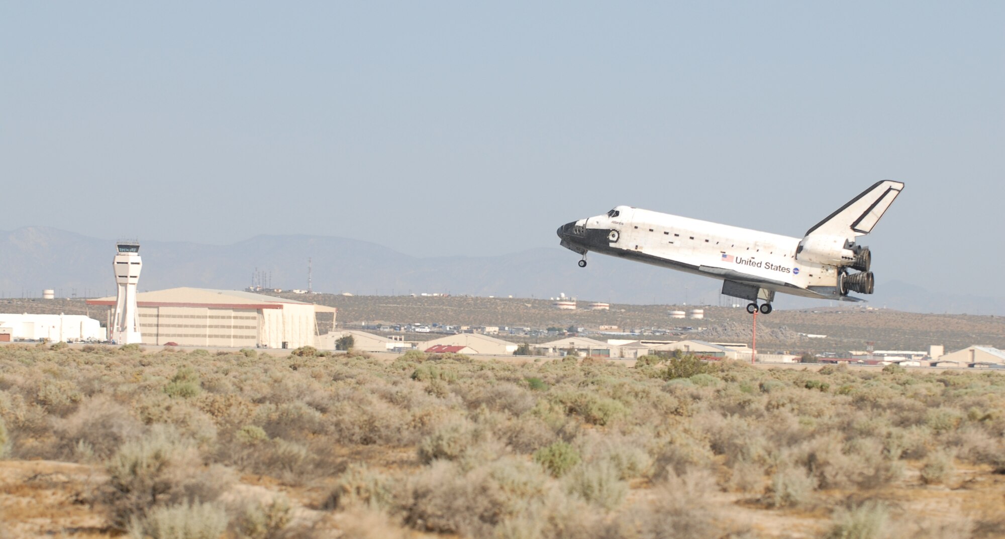 Space shuttle STS-125 Atlantis lands at Edwards May 24 after completing a 13-day journey of approximately 5.3 million miles in space. The Atlantis crew performed five spacewalks on five consecutive days to repair and upgrade the Hubble Space Telescope. This is the 53rd time NASA has been required to use Edwards as its alternate landing site. (U.S. Air Force photo/Senior Airman Julius Delos Reyes)