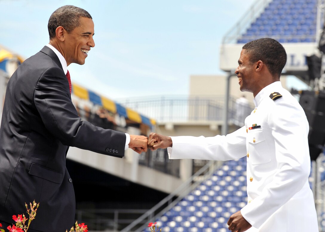 U.S. President Barack Obama congratulates a newly commissioned Navy Ensign during the U.S. Naval Academy Class of 2009 graduation and commissioning ceremony, Annapolis, Md., May 22, 2009. Obama delivered his first graduation speech as Commander-in-Chief to an audience of nearly 30,000 at Navy-Marine Corps Memorial Stadium in Annapolis, Md.