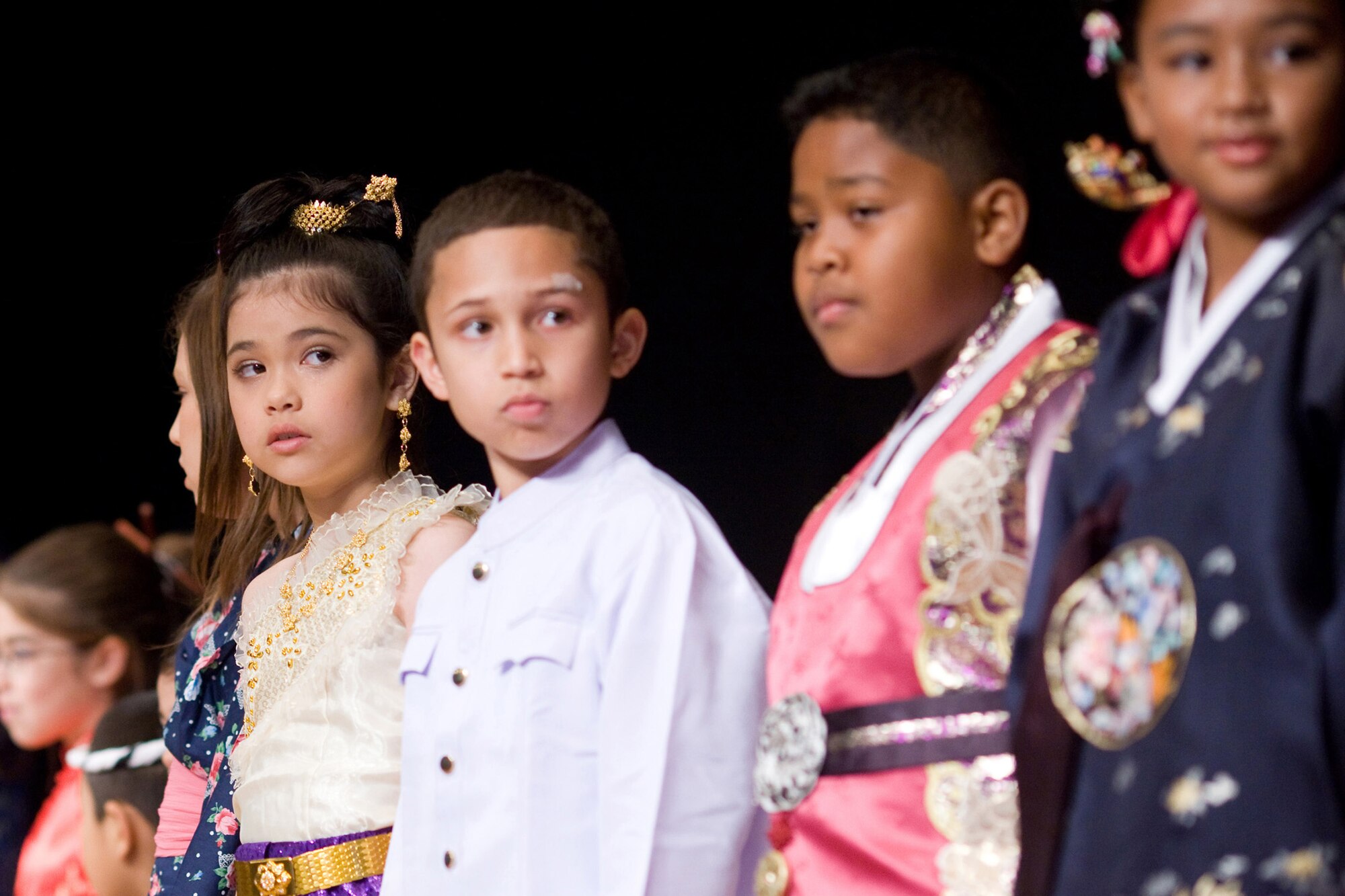 YOKOTA AIR BASE, Japan -- Yokota West Elementary School students display traditional outfits from a variety of cultures May 21 at the school's Asian Pacific American Heritage Celebration. The celebration also included music and dance performances from a variety of Asian Pacific cultures. (U.S. Air Force photo/Osakabe Yasuo)