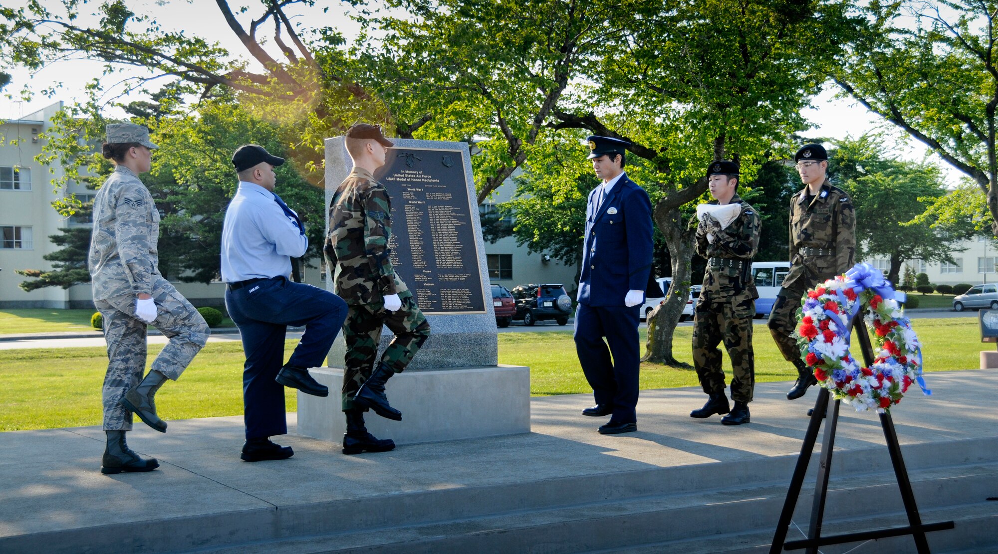 MISAW AIR BASE, Japan -- Members of the Misawa Honor Guard and Japan Air Self-Defense Force Honor Guard take part in a retreat ceremony to wrap up National Police Week May 15, 2009. A weapons and vehicle demonstration and physical training challenge also took place during the week of commemoration. (U.S. Air Force photo by Senior Airman Jamal D. Sutter)