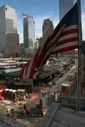 An American Flag flies near the Ground Zero construction site. Marines from Special Purpose Marine Air Ground Task Force New York led a run to the site and placed a wreath as a sign of respect for those who died in the 9/11 attacks, May 26. (Official Marine Corps photo by Sgt. Steve Cushman)