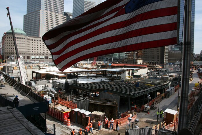 An American Flag flies near the Ground Zero construction site. Marines from Special Purpose Marine Air Ground Task Force New York led a run to the site and placed a wreath as a sign of respect for those who died in the 9/11 attacks, May 26. (Official Marine Corps photo by Sgt. Steve Cushman)
