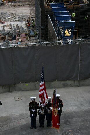 The 24th Marine Expeditionary Unit color guard stands in front of Ground Zero as a part of a ceremony in New York City, May 26. Marines from Special Purpose Marine Air Ground Task Force New York led a run to the site and placed a wreath as a sign of respect for those who died in the 9/11 attacks. (Official Marine Corps photo by Sgt. Steve Cushman)