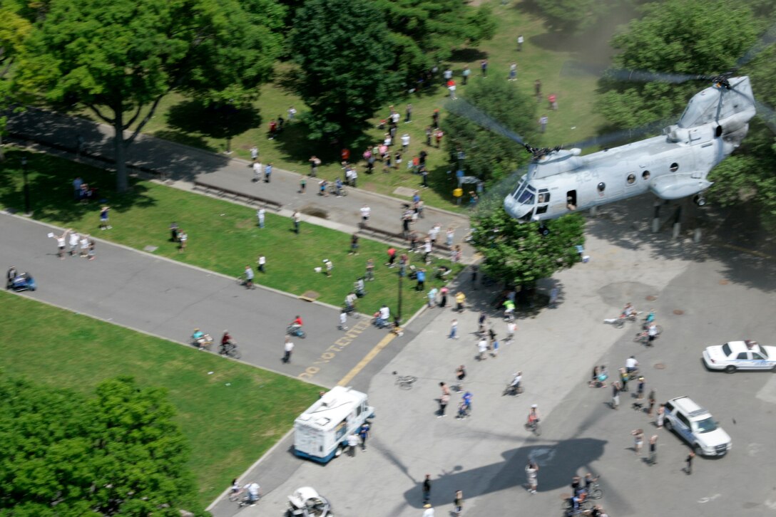 Marines from 2nd battalion 6th Marines participate in a practice raid in Flushing meadows park to demonstrate the tactics the U.S. Marine Corps uses while raiding an area in an enemy territory. The Marines Flew in on the CH-46 helicopter on May 25, 2009. (US Marine Corps Photograph by Lance Cpl. Carl Payne)