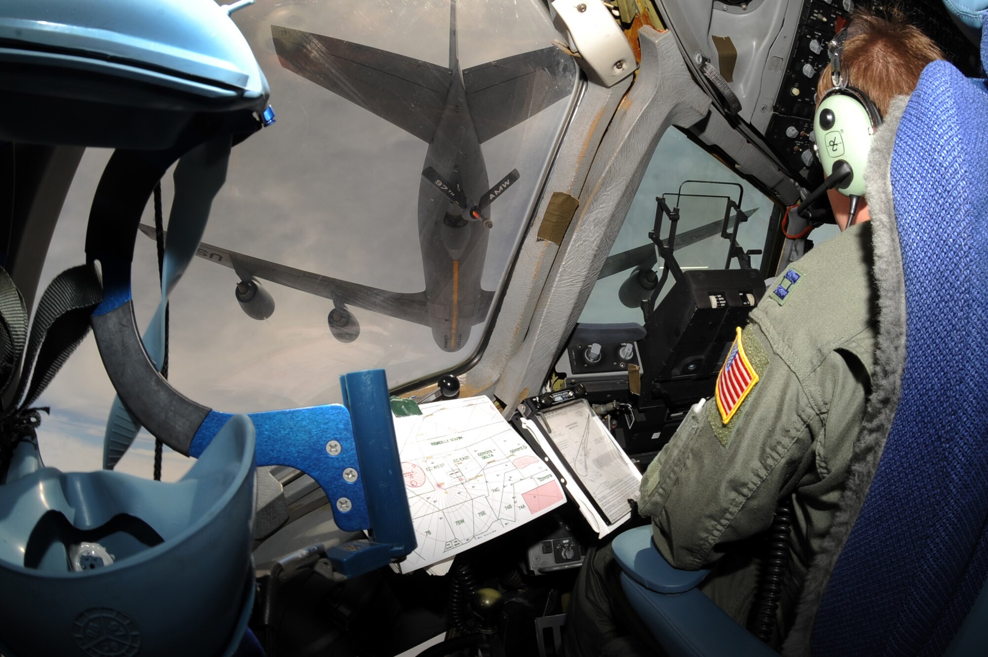 Capt. Mike Parker, of the 62nd Operations Group at McChord Air Force Base, Wash., positions his aircraft under a KC-135 Stratotanker for refueling during the Mobility Air Forces Exercise May 20 at Nellis AFB, Nev.  (U.S. Air Force photo/Senior Airman Brian Ybarbo)