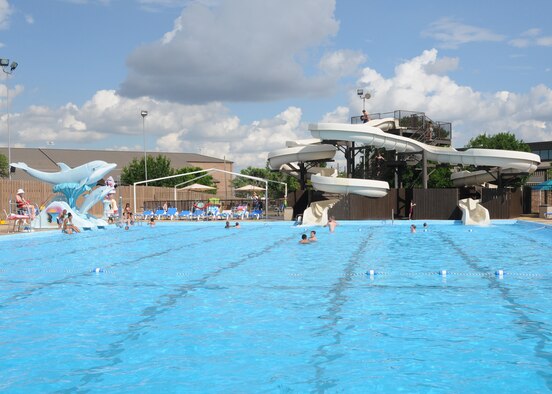 ALTUS AIR FORCE BASE, Okla. — The base swimming pool near the Family Community Center opened May 23 to all ID card holders and their families for summer 2009. Admission to the pool is $1.50 per day or $35 for a season pass. A two-person pass is $60 and $5 for each additional person afterwards, up to eight people. The pool is open Monday, Wednesday, Thursday and Friday from 1:00 to 8:00 p.m., Saturday from 11:00 a.m. to 10:00 p.m. and Sunday from 11:00 a.m. to 8:00 p.m. Lap swim is available Monday, Wednesday, Thursday and Friday from 11:00 a.m. to 1:00 p.m. Squadrons may reserve the pool for parties on Tuesdays by calling Outdoor Recreation. (U.S. Air Force photo/Airman 1st Class Tiffany M. Deuel)