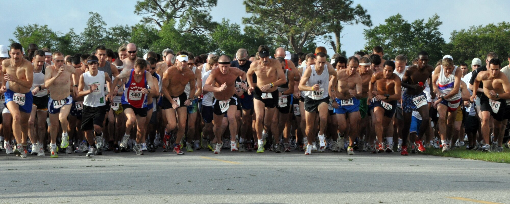 EGLIN AIR FORCE BASE, Fla. – Athletes ‘take off’ on a 4.4 mile run during the 24th Annual Gate-to-Gate Run May 25, here. The event is an Eglin tradition dating back to 1985, when now retired Lt. Gen. Gordon Fornell, former Armament Division commander here, proposed a run as a way to keep Airmen on base for Memorial Day due to the rise in injuries and fatalities involving Airmen. Traditionally, the run went from gate to gate but was recently modified for safety reasons. More than 1,950 runners participated in the event ranging from ages eight to 87. Matthew Martin, 26, from Hoover, Ala., was the first to finish with a time of 23:34. 2nd Lt. Ilea Eskildsen, 23, was the first female to finish with a time of 27:24. (U.S. Air Force photo/ Airman Anthony Jennings)