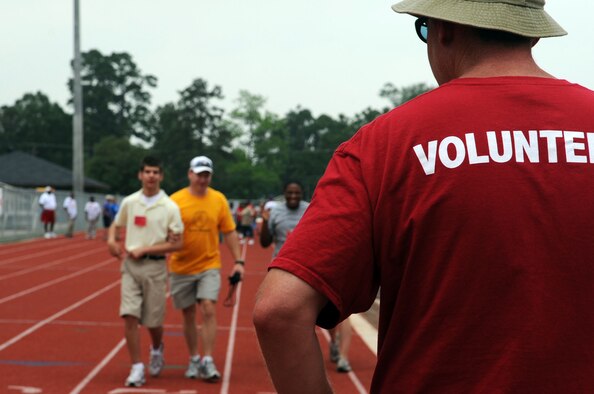 Barksdale Airmen, along with volunteers from the local community, team up to assist more than 350 athletes from Caddo Parish Schools and the Shreveport Parks and Recreation program during the Special Olympics. The event was held at Northwood High School May 7. (U.S. Air Force photo by Airman 1st Class Brittany Y. Bateman)
