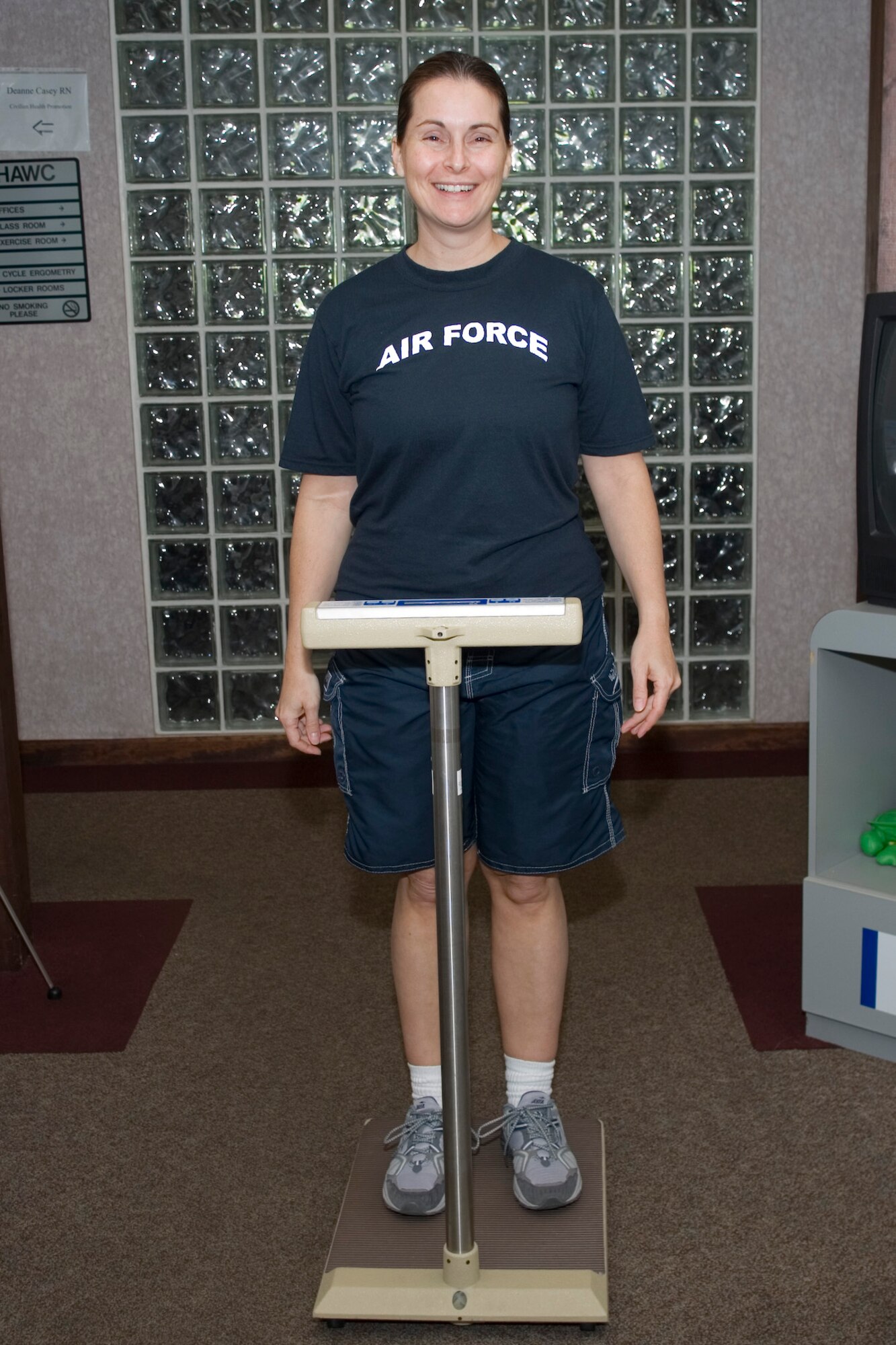 Master Sgt. Monica Monfette weighs in at the Hanscom Health and Wellness Center May 26.  Sergeant Monfette was one of many Hanscom members who participated in the Team Lean Challenge, which began March 2 and wraps up June 5.  (USAF Photo by Rick Berry)
