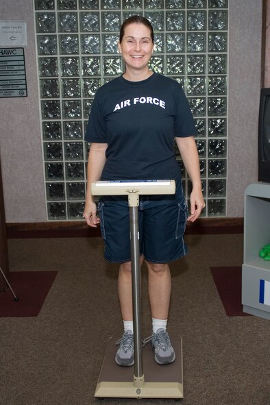 Master Sgt. Monica Monfette weighs in at the Hanscom Health and Wellness Center May 26.  Sergeant Monfette was one of many Hanscom members who participated in the Team Lean Challenge, which began March 2 and wraps up June 5.  (USAF Photo by Rick Berry)
