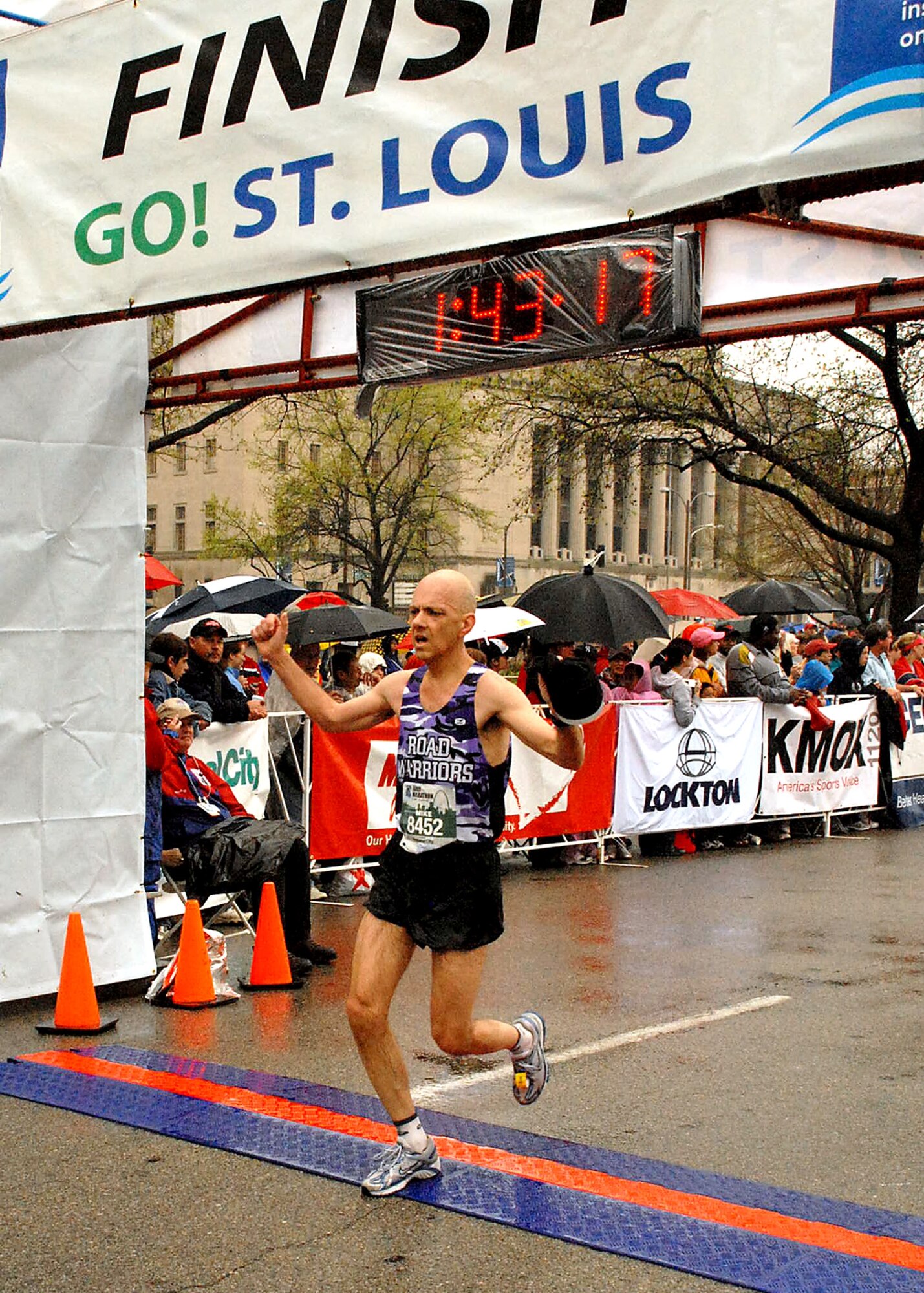 Master Sgt. Mike Sanders finishing the Go! St. Louis Half-Marathon in April.  Sergeant Sanders ran the race to celebrate being cancer free for one year.  "Running it hurt, but not like going through cancer," said Sergeant Sanders.  (Photo courtesy Master Sgt. Mike Sanders) 