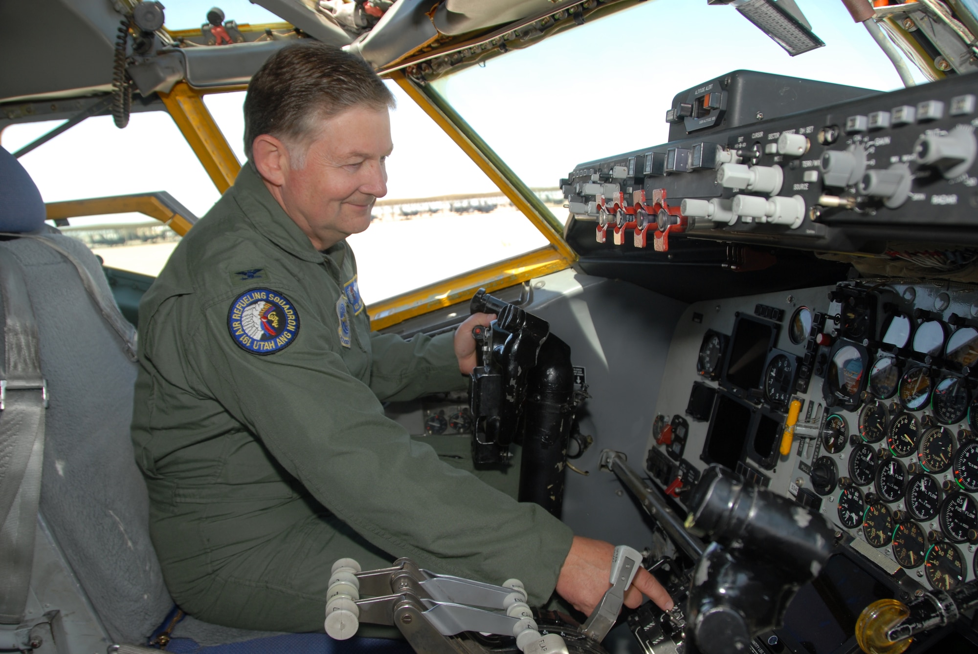 Col. Kelvin Findlay, 151st Air Refueling Wing commander, sits in the cockpit of the Utah Air National Guard's last KC-135 E-model Stratotanker before it was flown from the Air Guard base in Salt Lake City to nearby Hill Air Force Base where it was officially accepted into the Hill Aerospace Museum for public display.  (U.S. Air Force photo/Staff Sgt. Emily Monson)