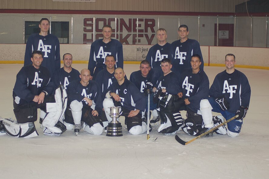 The 552nd Air Control Wing's Canadian Component hockey team squared off against their fellow American Airmen in the first annual Can/Am Cup May 15. After a spirited game, the American Component team ended up with the trophy. (Photo Courtesy of Mr. John Banks) 