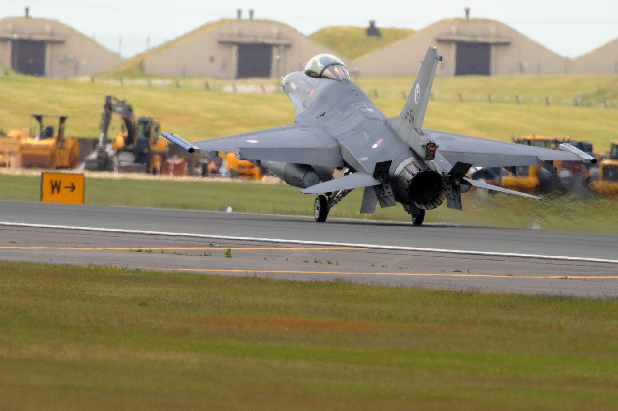 An F-16 from the 312th Fighter Squadron, Royal Netherlands Air Force, lands at RAF Lakenheath, England May 26, 2009. The pilots will be performing dissimilar air combat training against the 493rd FS on their way home May 27. The one day event is part of the two squadron?s ongoing international relationship. It provides the pilots an opportunity to train against aircraft other than the ones they?re flying, enhancing their skills and granting them experience unavailable if they didn?t train together. (U.S. Air Force photo by Staff Sgt. Nathan Gallahan)
