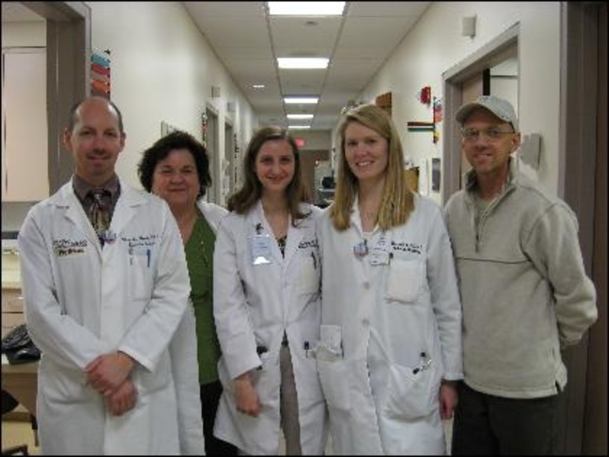 Master Sgt. Mike Sanders, pictured here with the team of medical personnel that oversaw his radiation treatment during his fight with cancer. (Photo courtesy Master Sgt. Mike Sanders) 