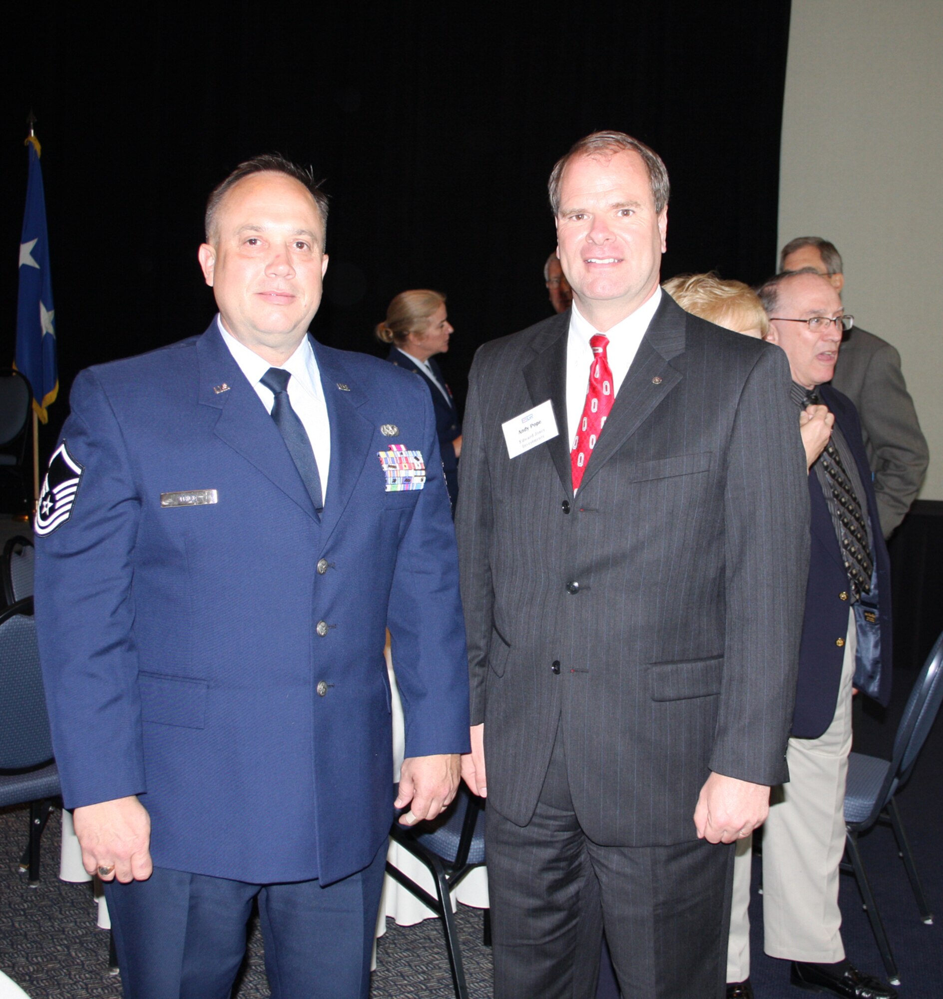 WRIGHT-PATTERSON AIR FORCE BASE, Ohio - Master Sgt. Thomas Trice, 445th Civil Engineer Squadron, stands with his civilian employer, Andrew Pope of Edward Jones Investments, at the Ohio Committee for the Employer Support of the Guard and Reserve Annual Employer Recognition Luncheon May 1. Mr. Pope, Mr. Bo Wyenandt of Advanced Transportation Systems, Inc., and Mr. Greg Holler of Cargill, received the Above and Beyond Award, and represented 30 companies recognized during the luncheon of more than 1,200 submitted for Patriot Awards. The agencies were recognized for providing medical benefits, making up the difference in salary; sending care packages; and providing support for the deployed member's family. (Air Force photo/Maj. Cynthia Harris)