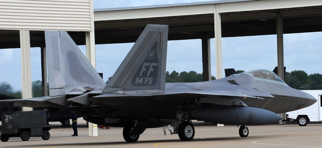 LANGLEY AIR FORCE BASE, Va. – An F-22A Raptor from the 94th Fighter Squadron taxis in preparation for departure to Kadena Air Base, Japan, May 26.  More than 280 Langley Airmen and 12 F-22A Raptors depart this week for their Air Expeditionary Force deployment, which demonstrates the continued U.S. commitment to fulfill its security responsibilities throughout the Western Pacific.  This is the first overseas deployment for the 94th Fighter Squadron since transitioning to the F-22.  (U.S. photo/Senior Airman Zachary Wolf)