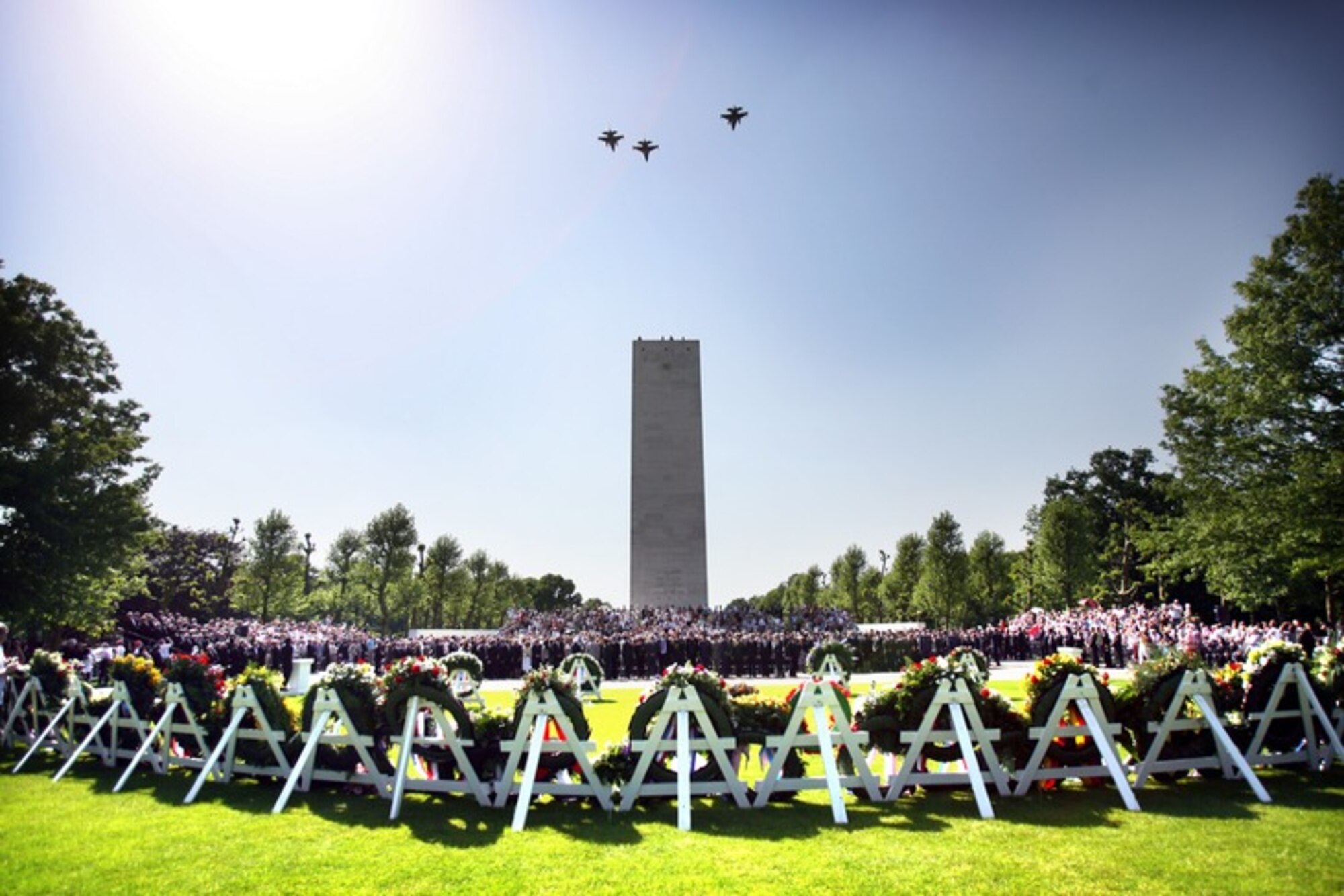 MARGRATEN, The Netherlands – A missing man formation flies overhead during a Memorial Day ceremony  May 24, 2009 at the Netherlands American Cemetery and Memorial. There are 8,302 soldiers buried there under rows of white crosses and stars of David. All of the graves are adopted by locals, who occasionally tend to the graves and lay flowers. (Courtesy photo)