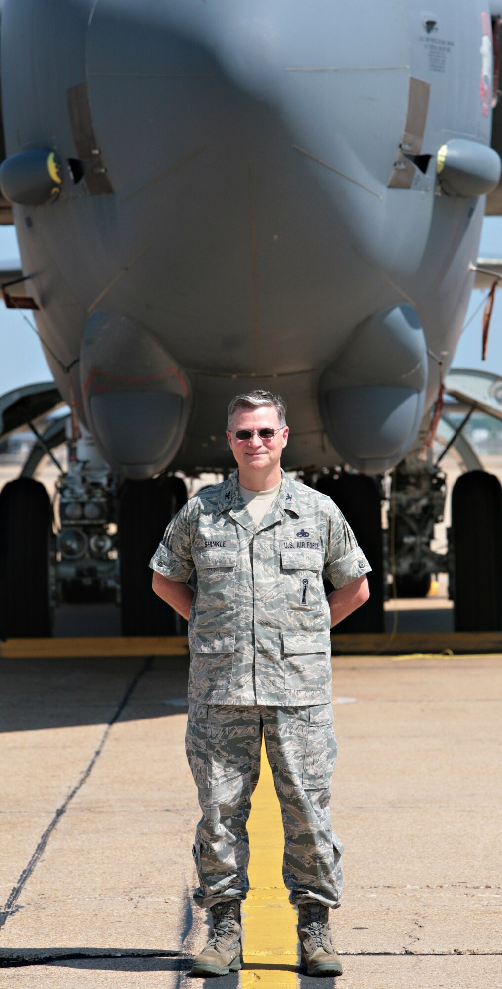 Col. Steven Shinkle stands in front of a B-52 at Barksdale prior to his retirement after 32 years of service. 