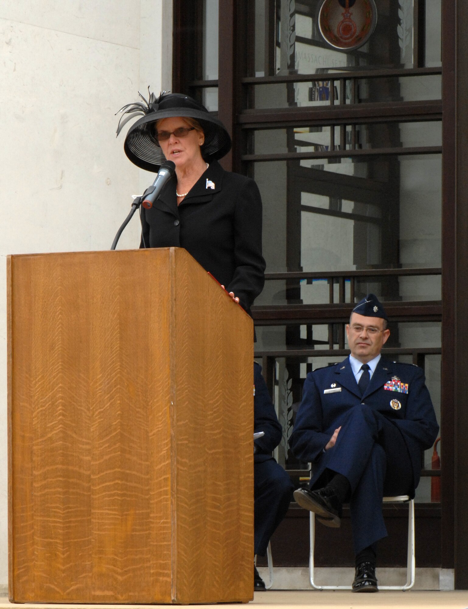 Jonna Doolittle-Hoppes, granddaughter of Gen. James H. "Jimmy" Doolittle, speaks of the courage and humility of the soldiers she has met as a writer during the Memorial Day ceremony at Madingley Memorial Cemetery, May 25, 2009.  Ms. Doolittle-Hoppes said "I know her grandfather would be proud of the men and woman fighting today."  (U.S. Air Force photo by Senior Airman Christopher L. Ingersoll)