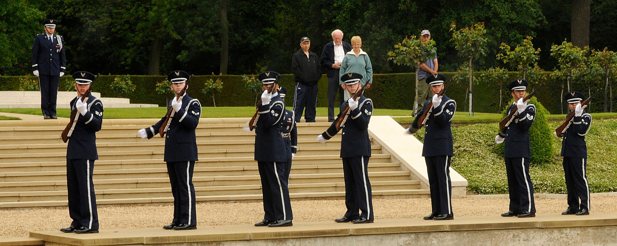 The RAF Mildenhall Honor Guard fires a 21-gun salute to honor the veterans buried at Madingley Memorial Cemetery on Memorial Day, May 25, 2009.  This year's ceremony is open to all and will be held May 31, at 11 a.m.  (U.S. Air Force file photo/Staff Sgt. Christopher L. Ingersoll)