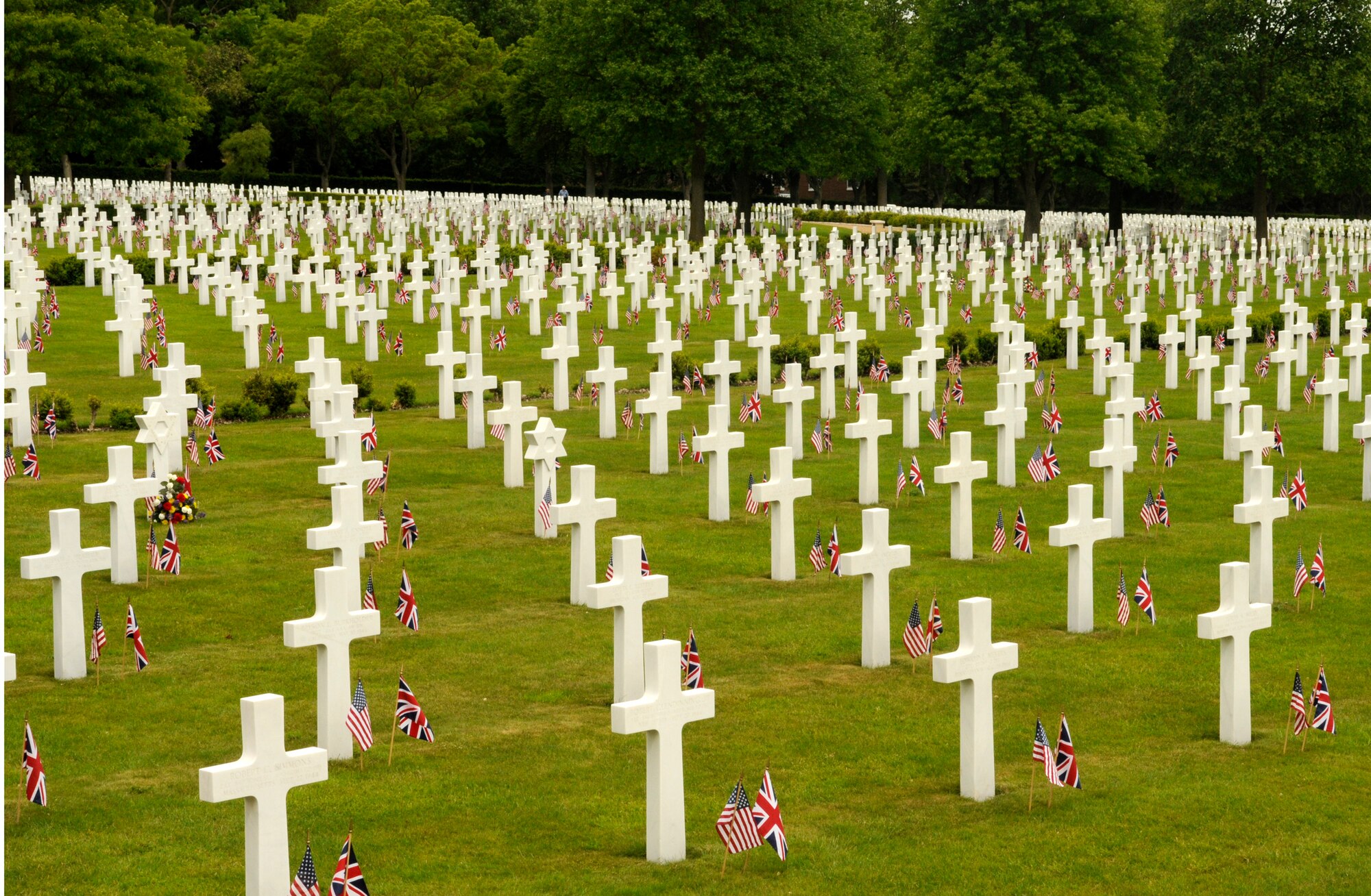 A ceremony is held on Memorial Day, May 25, 2009, to honor the thousands of American veterans laid to rest here at Madingley Memorial Cemetery.  The ceremony included key note speakers, wreath laying and fly-overs with a KC-135 Stratotanker from RAF Mildenhall and F-15E Strike Eagles from RAF Lakenheath.  (U.S. Air Force photo by Senior Airman Christopher L. Ingersoll)