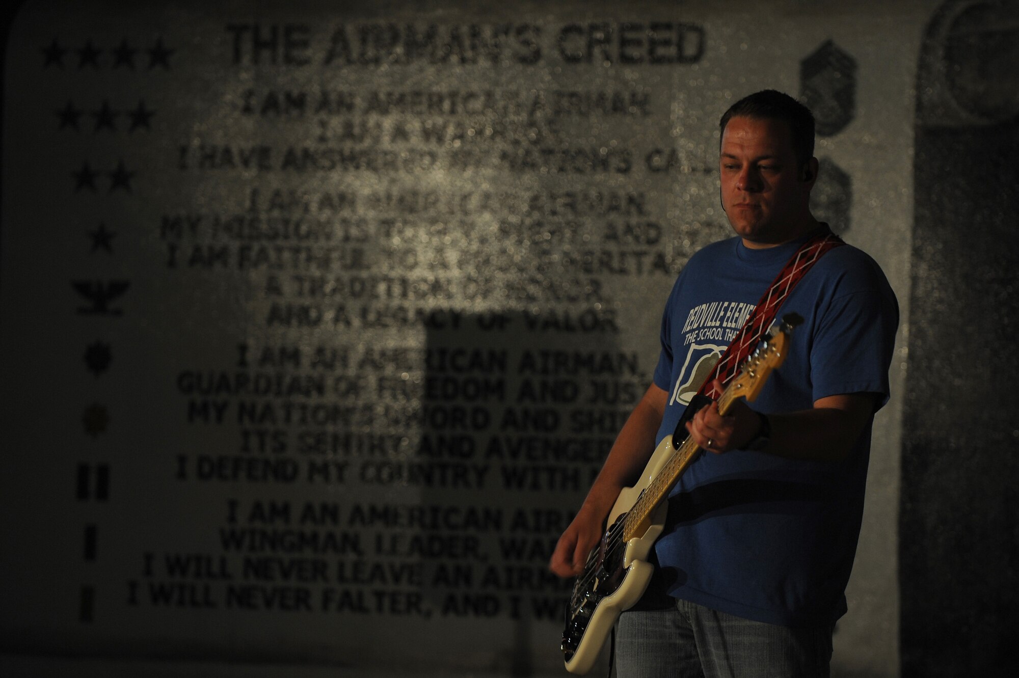 SOUTHWEST ASIA - Josh Knight lays down some low bass beats during The Stellas performance in front of Airman and Soldiers of the 380th Air Expeditionary Wing, May 17 at an undisclosed location in Southwest Asia. The band performed at several locations throughout Southwest Asia as part of an Armed Forces Entertainment tour. (U.S. Air Force photo by Senior Airman Brian J. Ellis) (Released)