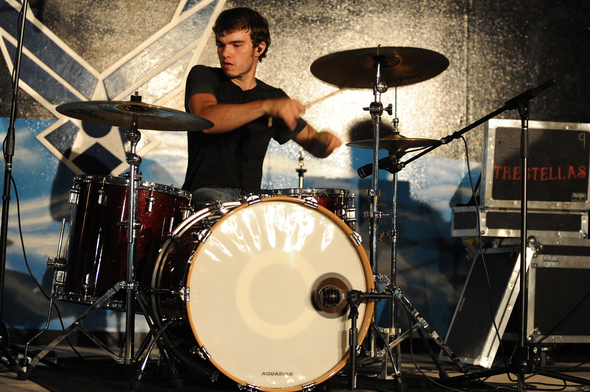 SOUTHWEST ASIA - The Stellas' drummer, Jacob Worden jams out in front of Airman and Soldiers of the 380th Air Expeditionary Wing, May 17 at an undisclosed location in Southwest Asia. The band performed at several locations throughout Southwest Asia as part of an Armed Forces Entertainment tour. (U.S. Air Force photo by Senior Airman Brian J. Ellis) (Released)