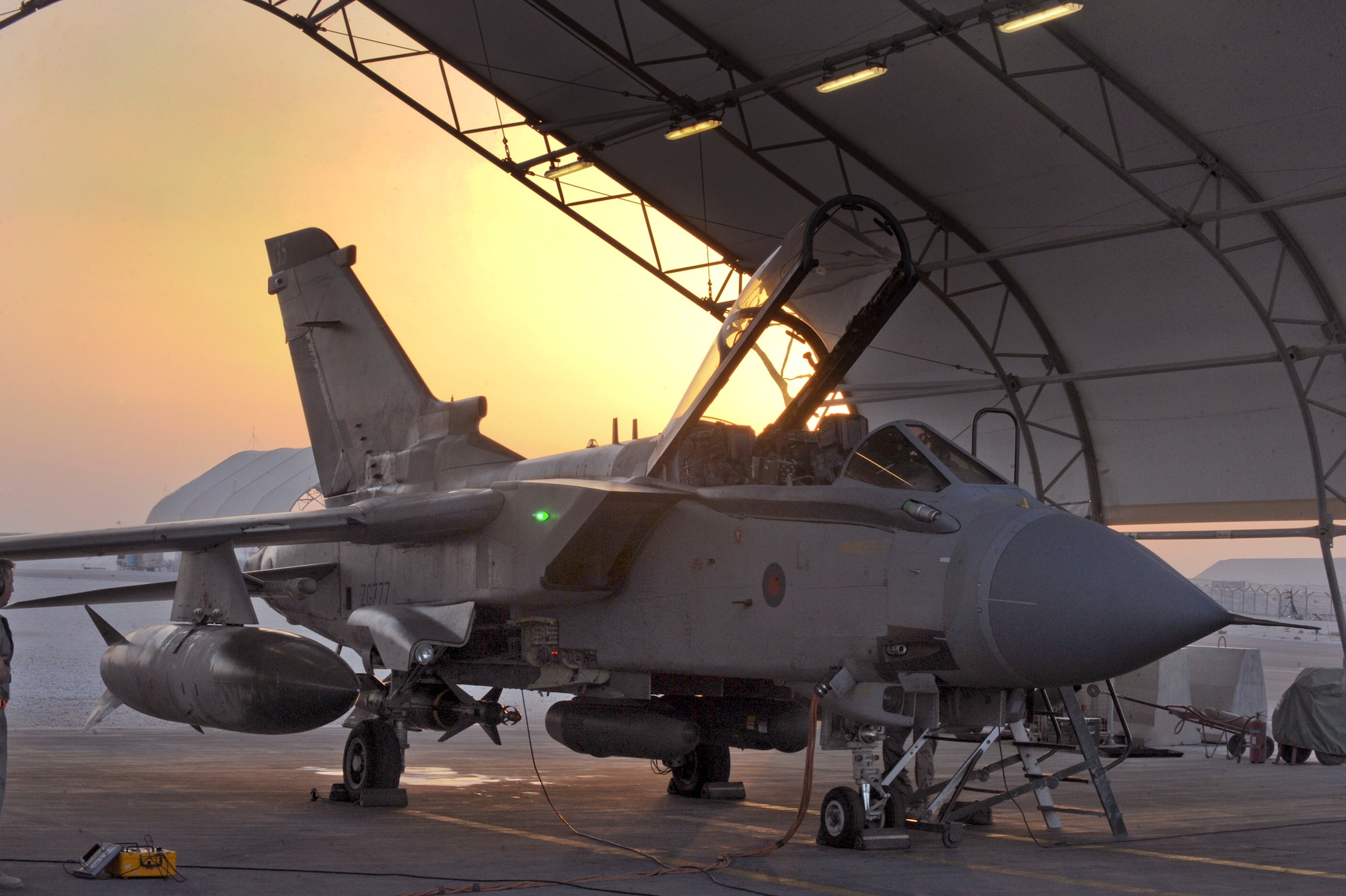 A Royal Air Force Tornado from the 2nd Squadron Tornado Detachment sits in the early morning light prior to a mission, May 25, 2009, in an undisclosed location in Southwest Asia.  The Tornado Detachment will cease operations from this location in the coming weeks.  (U.S. Air Force Photo by Staff Sgt. Joshua Garcia/released)