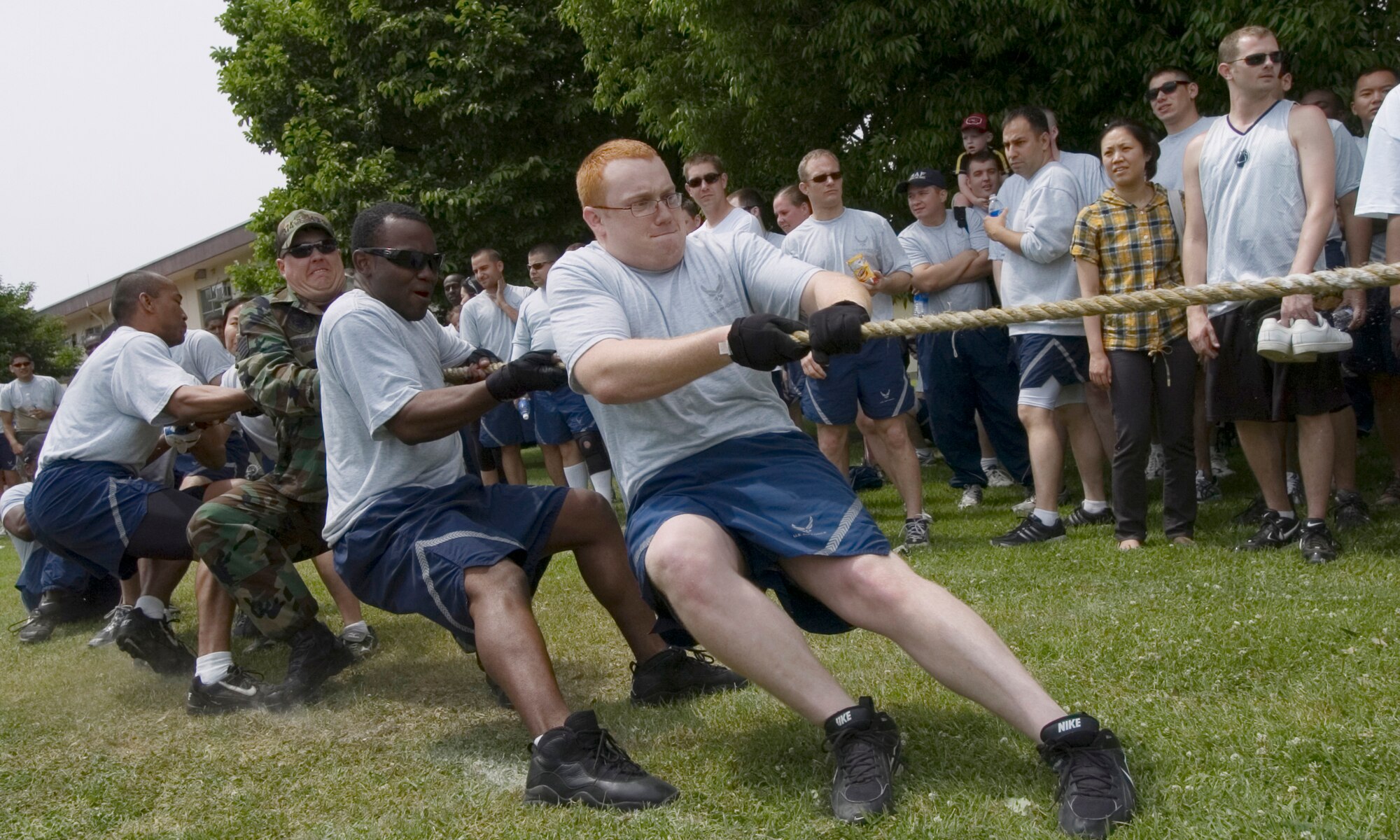 YOKOTA AIR BASE, Japan -- The 374th Civil Engineer Squadron won their first match during the tug-of-war competition May 21 at Yokota's Safety and Sports Day. The 36th Airlift Squadron won the tug-of-war event. Safety and sports day helped the base kickoff the 101 Critical Days of Summer, which runs through Labor Day. (U.S. Air Force photo/Master Sgt. Matt Summers)
