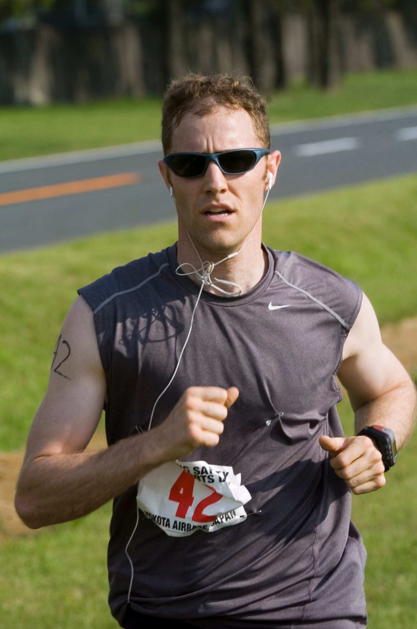 YOKOTA AIR BASE, Japan -- Capt. Nathan Frost, 5th Air Force, won the Samurai Challenge triathlon with a time of 44 minutes, 20 seconds May 21 at Yokota's Safety and Sports Day. The triathletes completed a 400-meter swim, 10K bike course and a 3-mile run. Airman 1st Class Blake Navarrette, 374th Medical Operations Squadron, finished second and Lora Kerr came in third. Safety and sports day helped the base kickoff the 101 Critical Days of Summer, which runs through Labor Day. (U.S. Air Force photo/Master Sgt. Matt Summers)