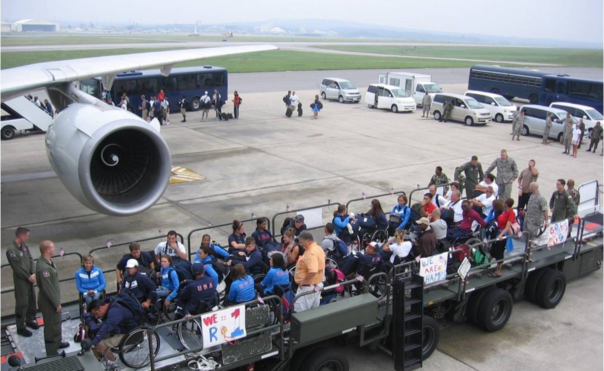 KADENA AIR BASE, Japan -- The 733d Air Mobility Squadron specially configured a 60K-Tunner to support the safe loading and unloading operations of the 120 athletes of the U.S. Paralympics Team while they transited Kadena AB on their way to the games in Beijing, China. (Courtesy photo)
