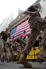 Marines from Special Purpose Marine Air Ground Task Force - New York run past the New York Stock Exchange, May 26, 2009. The Marines are in New York City as part of Fleet Week 2009. (Official Marine Corps photo by: Cpl. Patrick Fleischman)