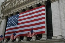 American Flags decorate the New York Stock Exchange facade May 26 in a sign of support to the Marines from Special Purpose Marine Air Ground Task Force New York who ran past the building. The Marines made their way to Ground Zero where they laid a wreath to honor those who died in the 9/11 attack. (Official Marine Corp photo by Lance Cpl. Jad Sleiman)