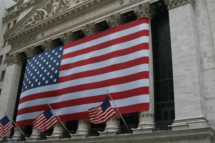American Flags decorate the New York Stock Exchange facade May 26 in a sign of support to the Marines from Special Purpose Marine Air Ground Task Force New York who ran past the building. The Marines made their way to Ground Zero where they laid a wreath to honor those who died in the 9/11 attack. (Official Marine Corp photo by Lance Cpl. Jad Sleiman)