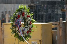 The Marines from Special Purpose Marine Air Ground Task Force New York placed this wreath at Ground Zero in remembrance to those who died in the 9/11 attacks here, May 26. (Official Marine Corp photo by Lance Cpl. Jad Sleiman)
