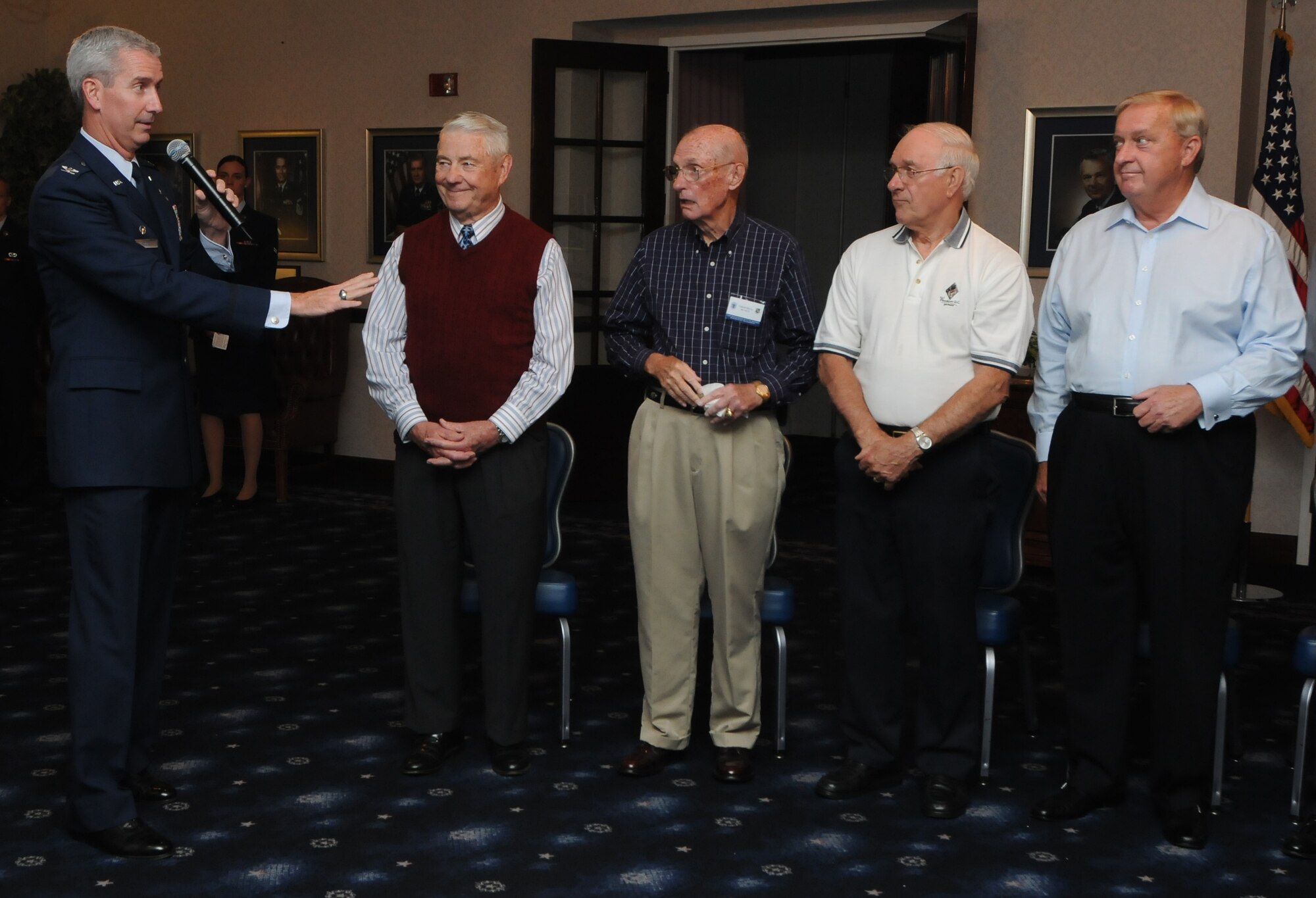 Col. Jon A. Roop, 11th Wing commander, gives an opening speech to former chief master sergeants of the Air Force during a CMSAF room dedication ceremony in the Bolling Club May 26 at Bolling AFB. The room was dedicated to honor our highest enlisted position and provided an opportunity for the newest generation of Airmen to interact with previous generations.  (U.S. Air Force photo by Senior Airman Alex Montes)