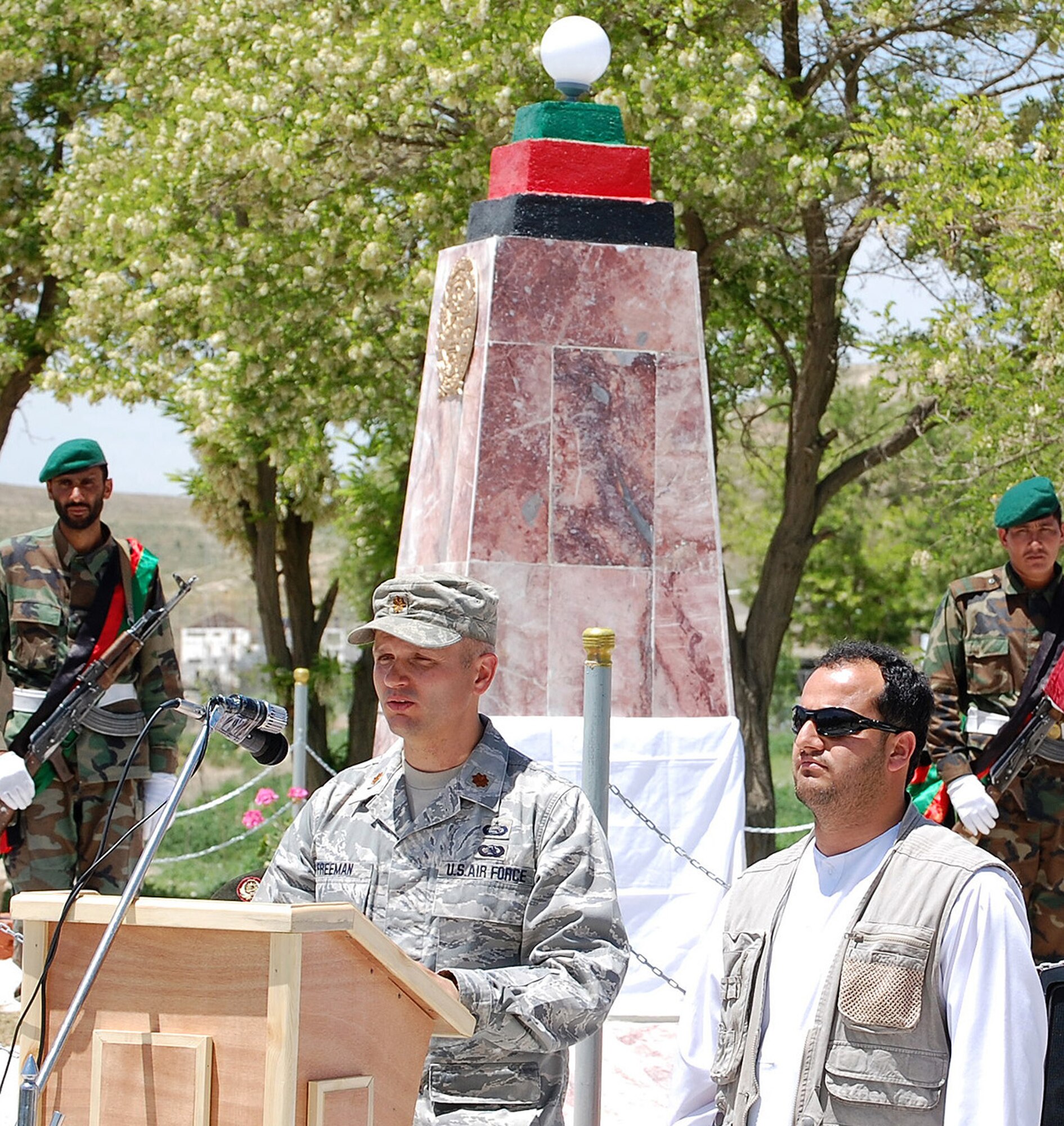 Maj. Brian Freeman talks about the bond shared between his team and the Afghan National Army unit. More than 250 U.S. servicemembers and Afghan security forces celebrated seven years of military cooperation, including 18 Airmen who have provided combat support and counter-insurgency training to more than 430 Afghan soldiers within the Afghan National Army in the last year. Major Freeman is a training team chief for more than 20 Airmen, Soldiers and Sailors embedded with the 5th Kandak (Battalion). (U.S. Air Force photo)