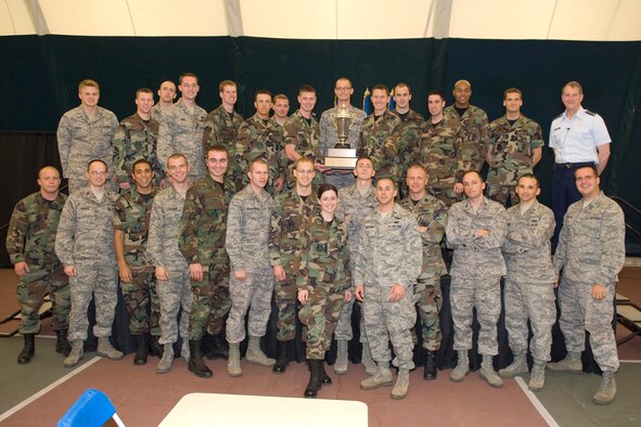HANSCOM AIR FORCE BASE, Mass. – Lt. Gen. Ted Bowlds, Electronic Systems Center commander, is shown with members of the Air Force Research Laboratory’s Olympic Team during the closing ceremony at the Tennis Bubble on May 21. The AFRL team placed second in Olympic competition and came in first place in the Commander’s Cup Challenge. (U.S. Air Force photo by Rick Berry)