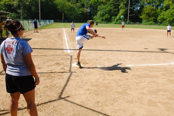 HANSCOM AIR FORCE BASE, Mass. –A player on the 653rd Electronic Systems Wing kickball team boots the ball during a game against the Air Force Research Laboratory on May 20.  Hanscom’s Olympic games wrapped up on May 21, the 66 ABW was the winner of the Olympic competition, the Air Force Research Laboratory placed second and the 653rd Electronic Systems Wing placed third. For the Commander’s Cup competition AFRL was the top place finisher. (U.S. Air Force photo by Rick Berry)