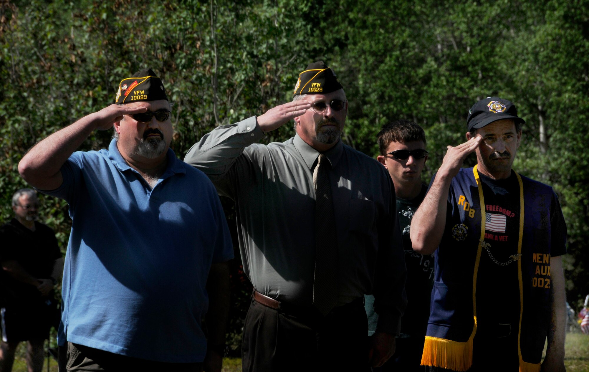 Veterans show their respect by honoring all Americans who have given their lives in service to our nation with a salute during a Memorial Day ceremony at Birch Hill Cemetery May 25, 2009, Fairbanks, Alaska. Every year, posts from the American Legion and Veterans Foreign Wars organize a series of Memorial Day services at various locations in honor of America’s fallen heroes. (U.S. Air Force photo/Airman 1st Class Laura Max)