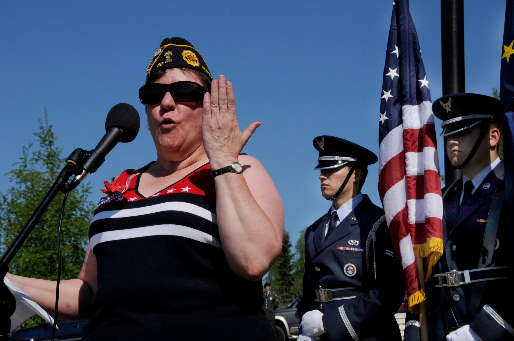 Michelle Blackmore speaks about the importance of Memorial Day at Birch Hill Cemetery May 25, 2009, Fairbanks, Alaska. Every year, posts from the American Legion and Veterans Foreign Wars organize a series of Memorial Day services at various locations in honor of America's fallen heroes. Ms. Blackmore is with American Legion Post 30.  (U.S. Air Force photo/Airman 1st Class Laura Max)