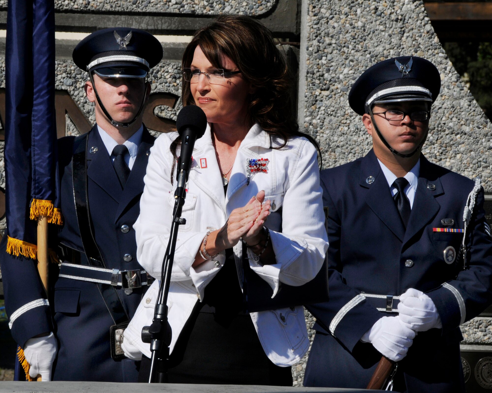 Alaska Governor Sarah Palin claps with the crowd after delivering the proclamation, May 25, 2009, Fairbanks. Alaska. Gov. Palin was one of the guest speakers at Veterans Memorial Park, to honor all Americans who have given their lives in service to our nation.  (U.S. Air Force photo/Airman 1st Class Laura Max)