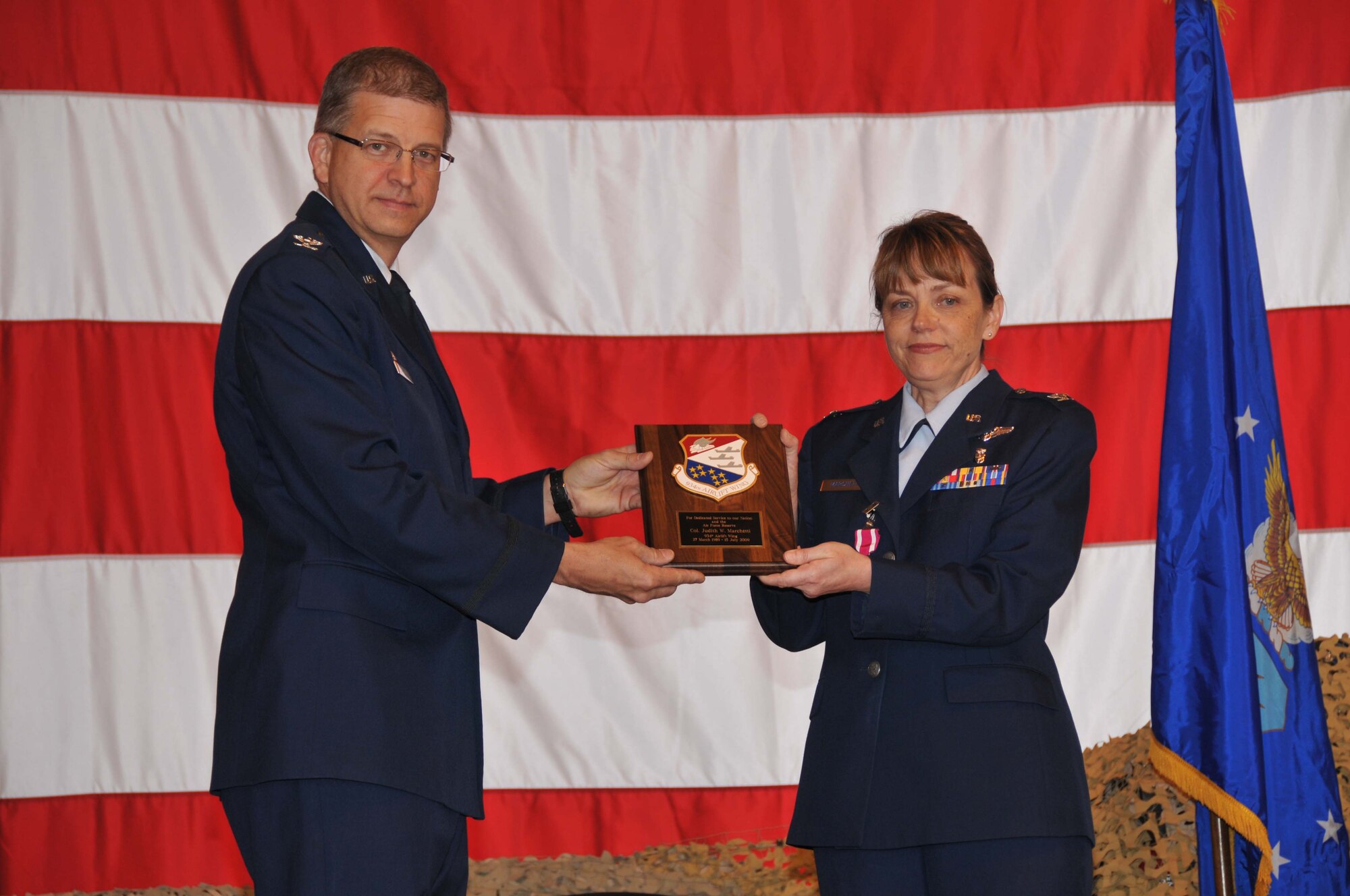 ASTS commander retires
Col. Judy Marchetti (right), 934th Aeromedical Staging Squadron commander, accepts her retirement plaque from Col. Tim Tarchick May 3. (Air Force Photo/Tech. Sgt. Bob Sommer)