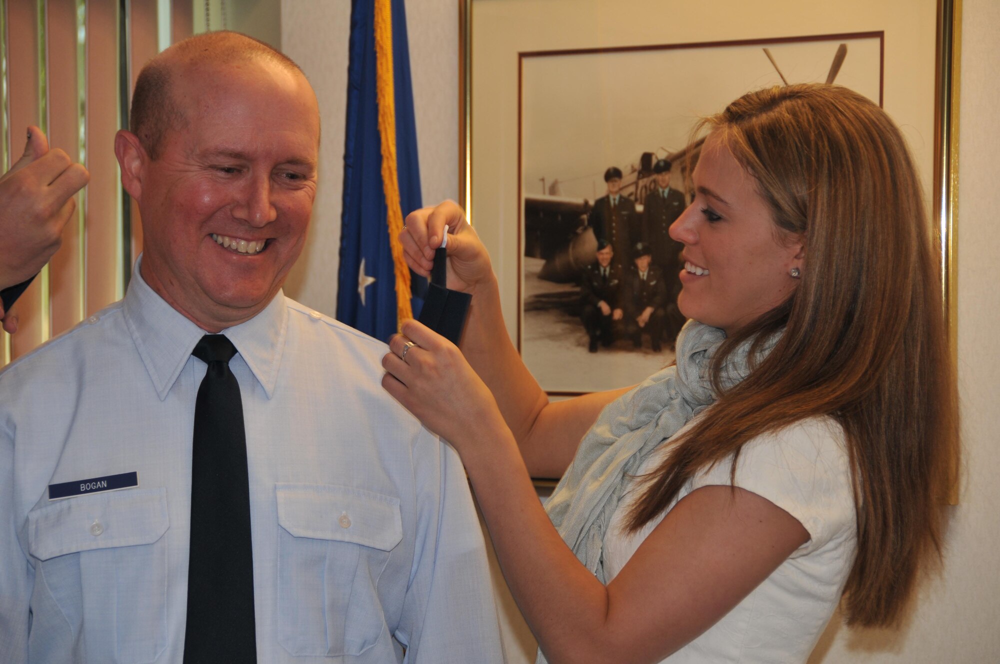 Family tradition
Col. Craig Bogan, 934th Mission Support Group deputy commander, has his new colonel eagles pinned on by his daughter, Kaitlyn (currently a U.S. Air Force Academy cadet), at a ceremony May 14. (Air Force Photo/Master Sgt. Paul Zadach)