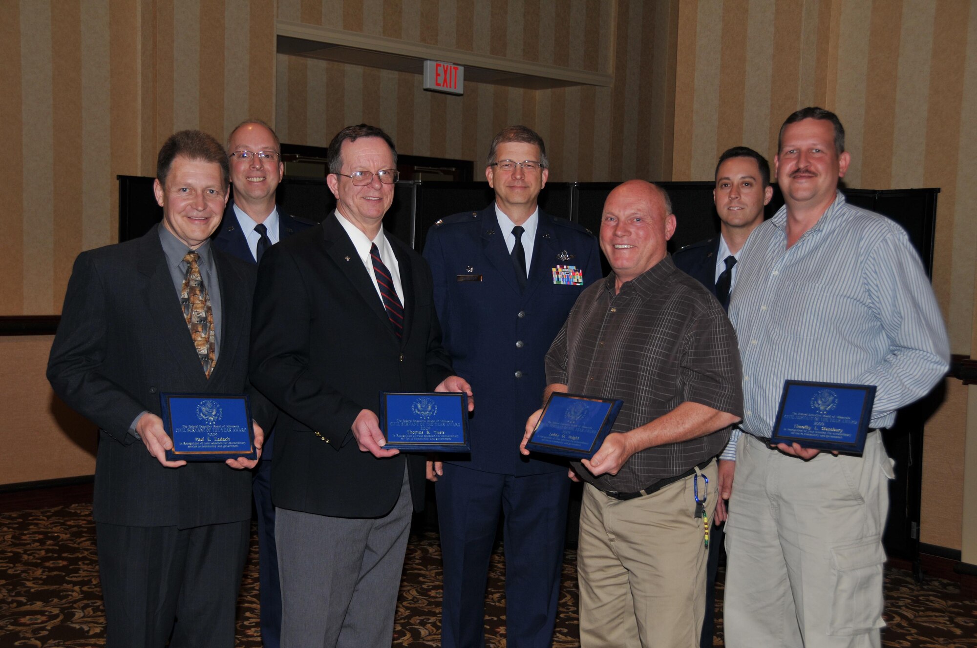 The Federal Executive Board recognized the 934th Airlift Wing Civil Servants of the Year at a ceremony May 8. Winners from front left are: Paul Zadach, Public Affairs, professional category; Thomas Theis, Maintenance, community category; LeRoy
Voight, Financial Management, administrative category and Timothy Stansbury, Maintenance, skilled trades
category. Back is Col. Eric Brandes, 934th Maintenance
Group commander, Col. Timothy Tarchick, 934th Airlift Wing commander, and Capt. John Drain, 934th Maintenance Squadron commander. (AirForce Photo/Capt. S.J. Brown)