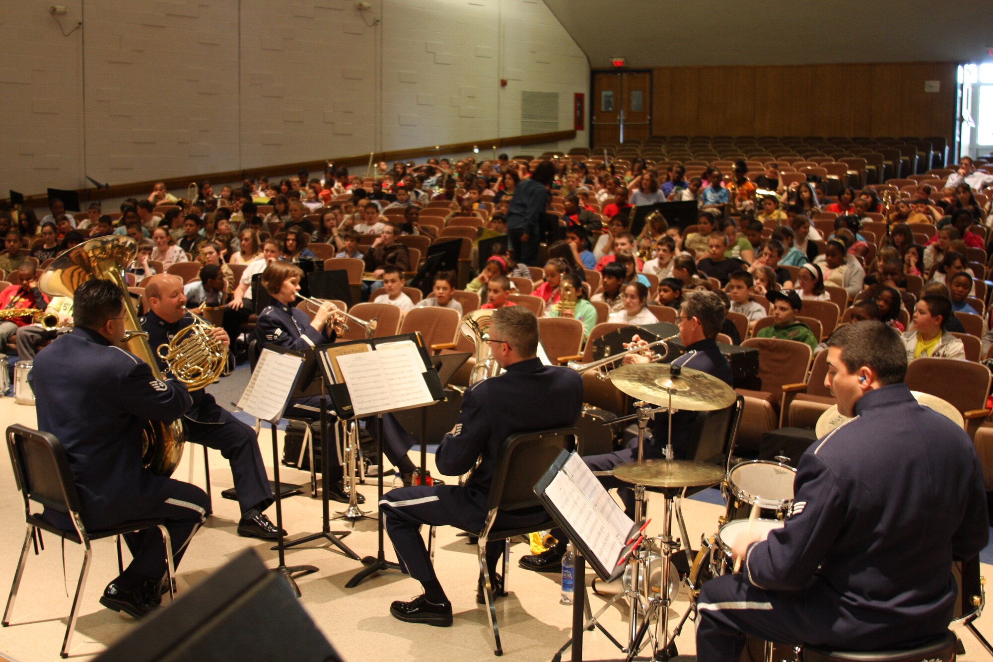 The Colonial Brass play for the wonderful audience of elementary school children bused in for the the day of music. 