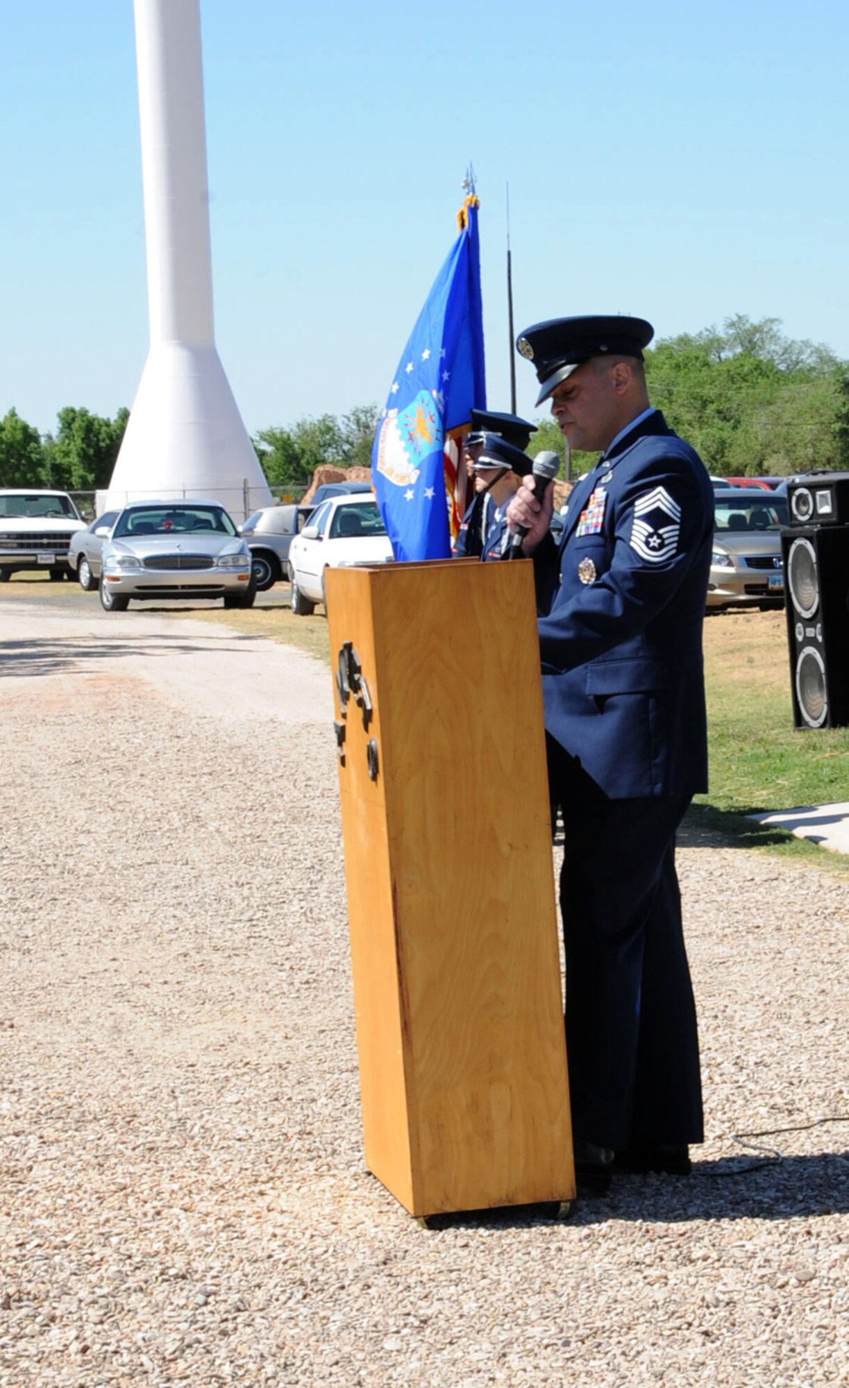 CANNON AIR FORCE BASE, N.M. -- Chief Master Sgt. Hector Baez, 27th Special Operations Mission Support Group superintendent, speaks during the annual Memorial Day observance at the Lawn Haven Memorial Gardens May 25 in Clovis. Ceremonies included presenting of the colors, a rifle volley,a rendering of Taps, bagpipes and a flyover by a Cannon AC-130H Spectre gunship. (U.S. Air Force photo by Airman 1st Class Maynelinne De La Cruz) 