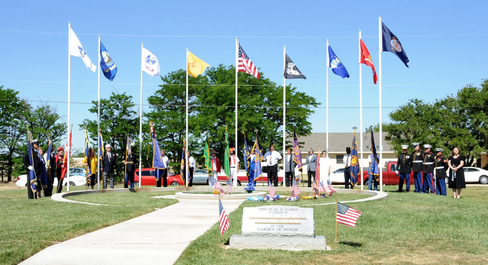 CANNON AIR FORCE BASE, N.M. -- Curry and Roosevelt counties' Joint Veterans Council sponsored a Memorial Day observance at the Garden of Honor May 25 in Clovis, N.M. The service included a 21-gun salute, the playing of Taps and a flyover of an AC-130H Spectre gunship from Cannon. Chief Master Sgt. Hector Baez, 27th Special Operations Mission Support Group superintendent, was the keynote speaker. (U.S. Air Force photo by Airman 1st Class Maynelinne De La Cruz) 
